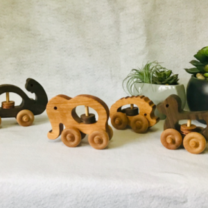 Handcrafted wooden toy rattles in Elephant, Hedgehog, Duck, and Turtle designs, perfect for engaging and entertaining little ones.